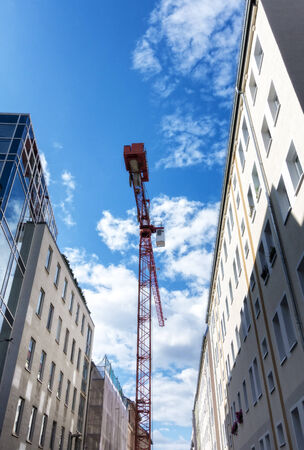 Crane in a narrow streetの写真素材