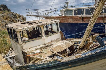 beached fishing boatの写真素材