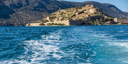 View from the water to the fortress Spinalongaの写真素材