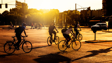 Biker at a busy street crossing in berlin centerのeditorial素材