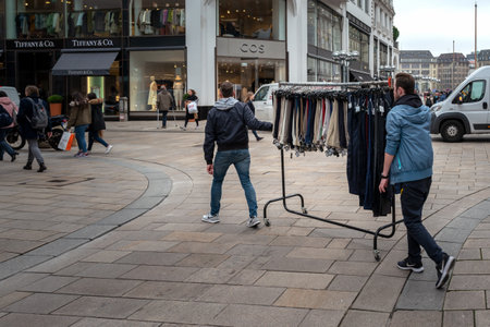 Employee of a fashion store in the transport of textのeditorial素材