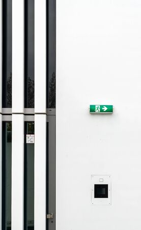 Front door with a note on a emergency exitの写真素材