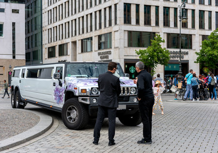 security staff at a stretch limousine in berlinのeditorial素材