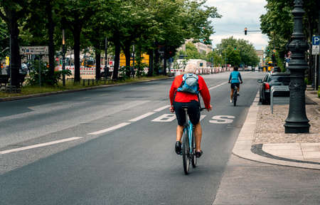 Cyclists in Berlin trafficの写真素材