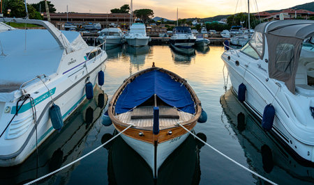 small fishing boats in a port in Sardiniaのeditorial素材