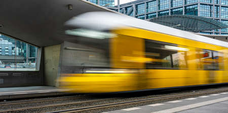 yellow tram in Berlin trafficの写真素材