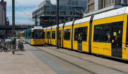 yellow tram in Berlin trafficの写真素材
