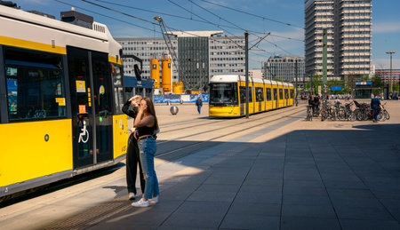 yellow trams at Alexanderplatz and in the cityscape of Berlinのeditorial素材