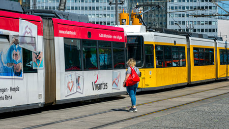 yellow trams at Alexanderplatz and in the cityscape of Berlin