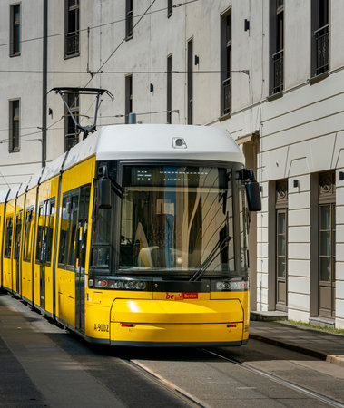 yellow trams at Alexanderplatz and in the cityscape of Berlinのeditorial素材