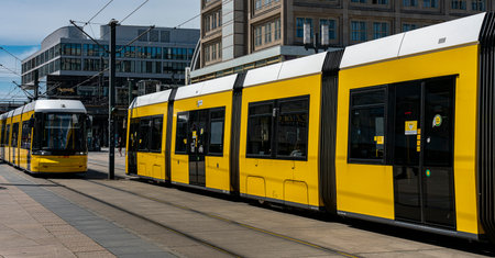 yellow tram in Berlin trafficのeditorial素材