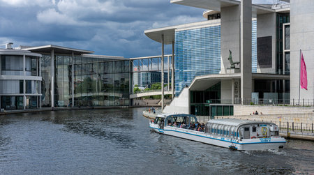 Architecture, tourists and excursion boats in Berlin's government districtのeditorial素材