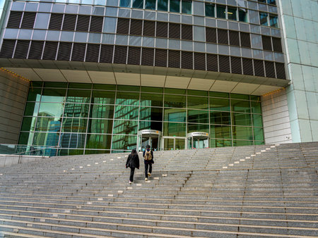 young Asian couple in front of the Commerzbank headquarters in Frankfurt am Mainのeditorial素材