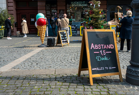 Frankfurt am Main, display pointing out the corona distanceのeditorial素材