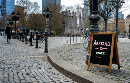 Frankfurt am Main, display pointing out the corona distanceのeditorial素材