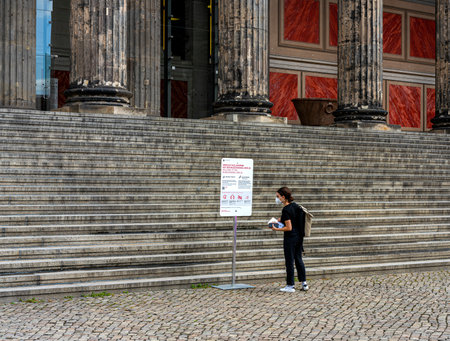 Corona hygiene notice on the stairs to the old museum in Berlinのeditorial素材