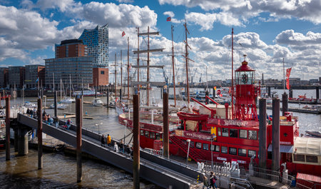 Ships and boats at the Elbphilharmonie and LandungsbrÃ¼cken in the port of Hamburg, Germanyのeditorial素材