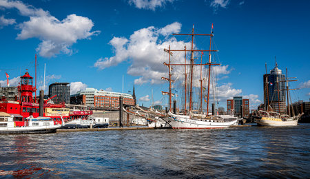 Ships and boats at the Elbphilharmonie and LandungsbrÃ¼cken in the port of Hamburg, Germanyのeditorial素材