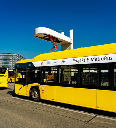 E-Metro bus at the charging station at the Zoologischer Garten bus station on Hertzstrasseのeditorial素材