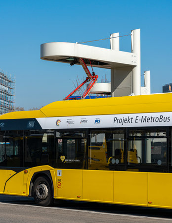 E-Metro bus at the charging station at the Zoologischer Garten bus station on Hertzstrasseのeditorial素材