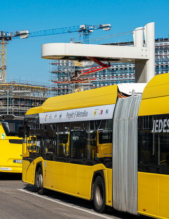 E-Metro bus at the charging station at the Zoologischer Garten bus station on Hertzstrasseのeditorial素材