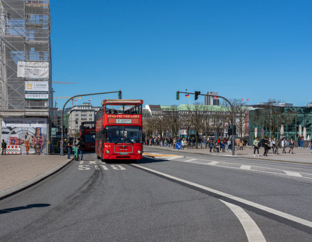 red hop on hop off sightseeing bus in downtown Hamburgのeditorial素材