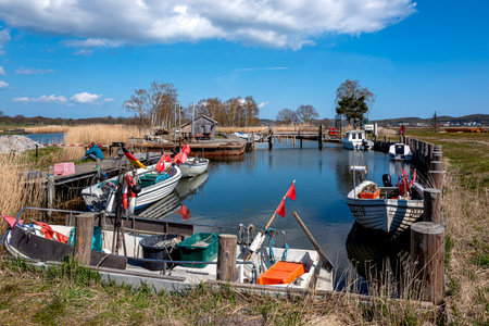 small fishing boats on Lake Sellin near Baabe, Ruegen islandのeditorial素材