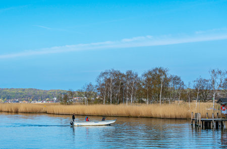 Ferry house and ferry on the Baabe-Sellin-Moritzdorf connecting canal, RÃ¼gen islandのeditorial素材