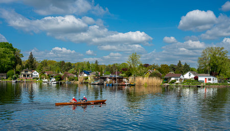 small jetties, recreational athletes and houses on the Havel between Berlin and Brandenburgのeditorial素材