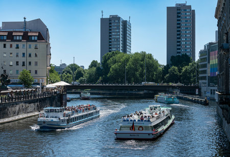 Steamboat ride in the summer midday heat, Spree at Nikolaiviertel, Berlinのeditorial素材