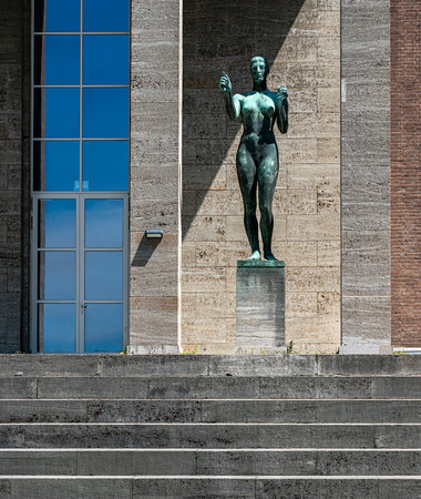 Decathlete and winner at the entrance to the pillar hall in the Olympic Park, Charlottenburg,のeditorial素材
