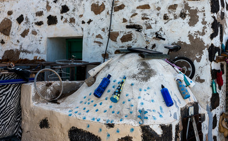 Hotchpotch of items in garden, Lanzarote, Canary Islands, Spainのeditorial素材