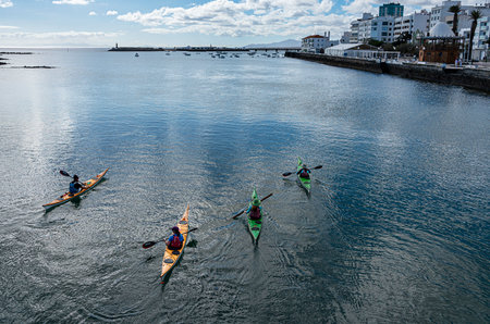 Paddle boats in the Charco de San Gines Lagoon, fishing boats, Arrecife, Lanzarote, Canary Islands, Spainのeditorial素材