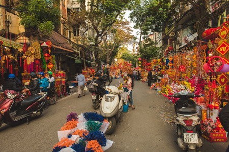 Hanoi, Vietnam - January, 23, 2017: A shot Illustrating the pre Tet preparations in Hanoi. Showing streets stalls in the old quarter, selling TET decorationsのeditorial素材