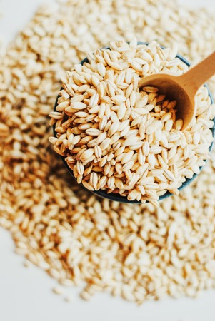 Close up of pearl barley. Pearl barley grain seeds.の写真素材