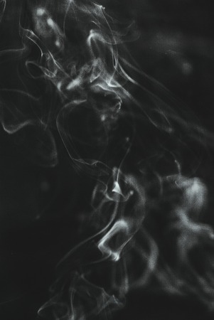 ghosts white smoke abstract on black background