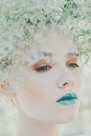Fashion portrait of Young blond woman.Beautiful Girl with green lips