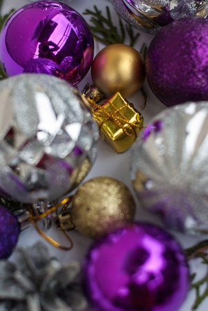 Purple and silver christmas decoration on white backgroundの写真素材