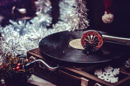 Image of Christmas. Gramophone playing a record.