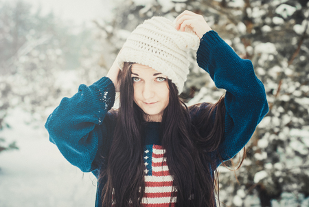 Happy winter moments of joyful young woman with brunette hair