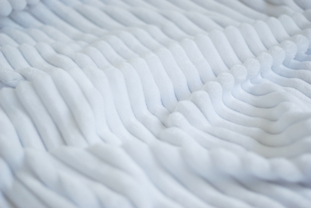 Fluffy Gentle baby white minky fabric with stripes. Soft pastel textile texture.の写真素材