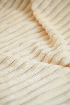 Fluffy Gentle baby beige minky fabric with stripes. Soft pastel textile texture.の写真素材