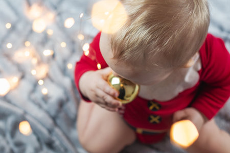 Beautiful little child is celebrating Christmas.の写真素材