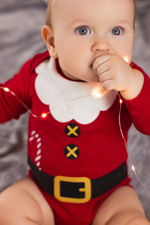 Beautiful little child is celebrating Christmas.