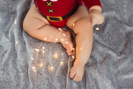 Beautiful little child is celebrating Christmas.
