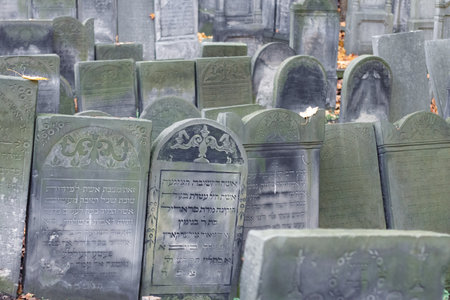 Old cemetery tombstones on a fall day.の写真素材