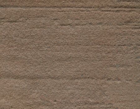 Background -section of rough sandstone texture taken from old wall.の写真素材