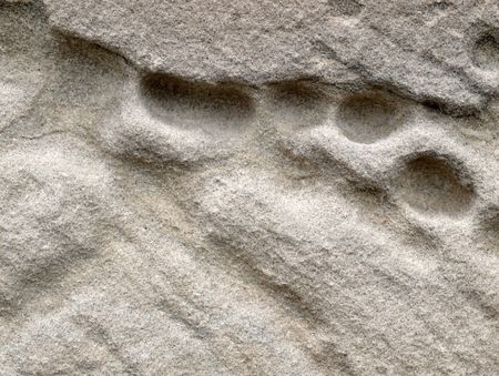 Background - section of sandstone showing weathering and erosion.の写真素材