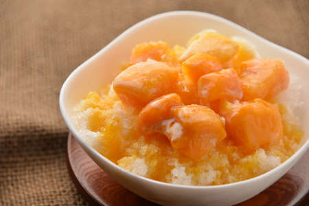 Shaved ice with mango sauceの写真素材