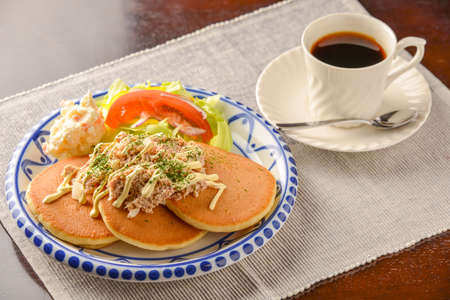 Pancake dish with tuna and mayonnaise sauceの写真素材